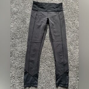 Lululemon black cropped leggings in size 4, 23 inch inseam.